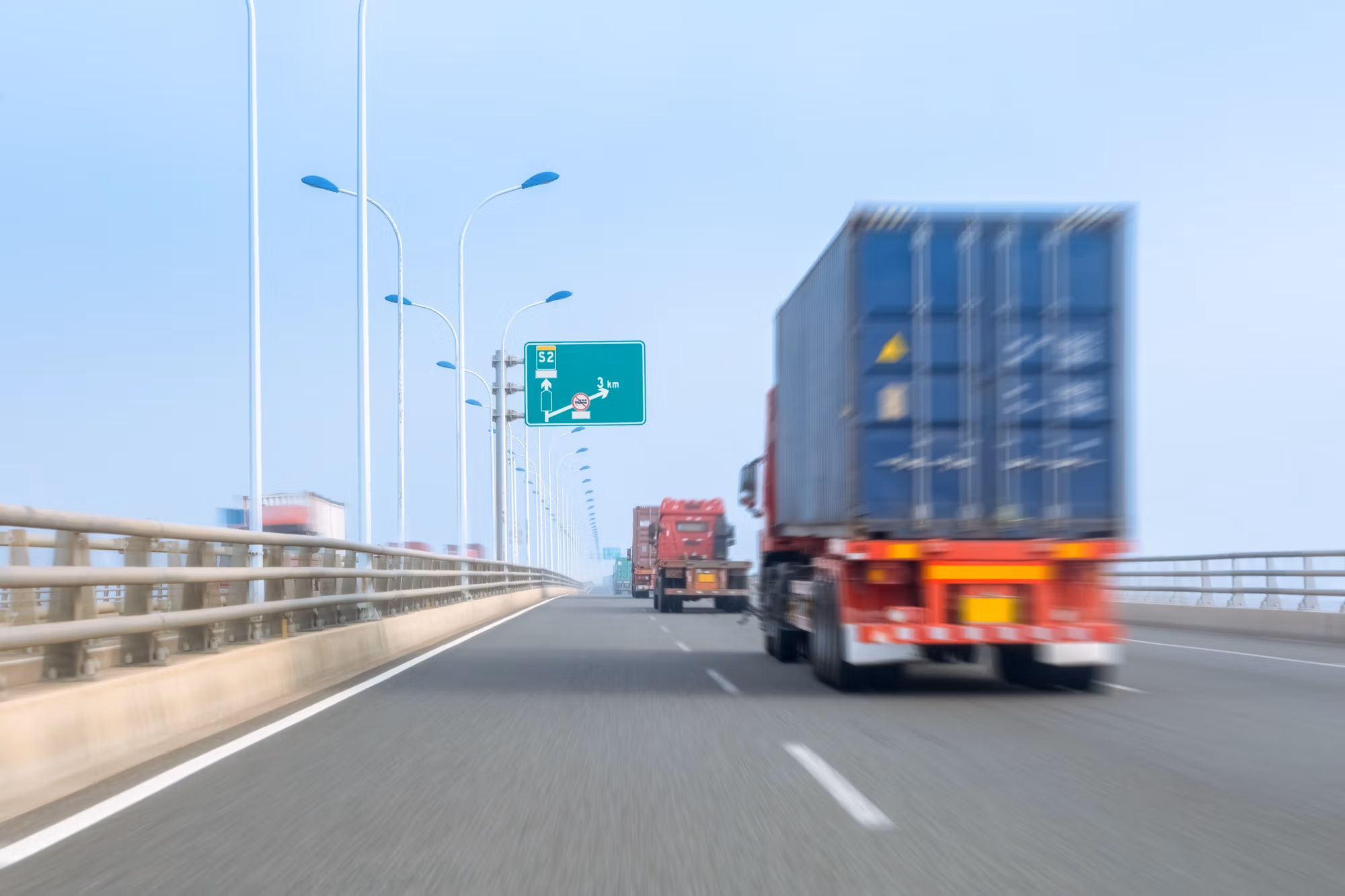 container trucks on bay bridge - Shore To Shore Shipping LLC container trucks on bay bridge
